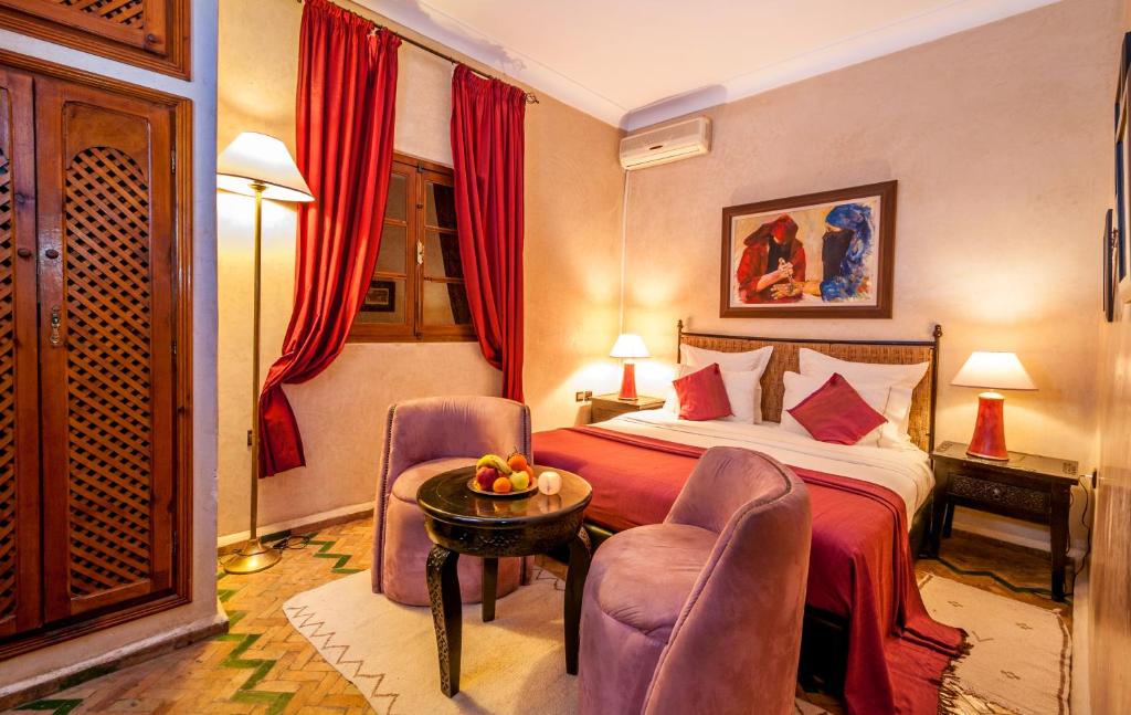 Postel nebo postele na pokoji v ubytování Riad Eden