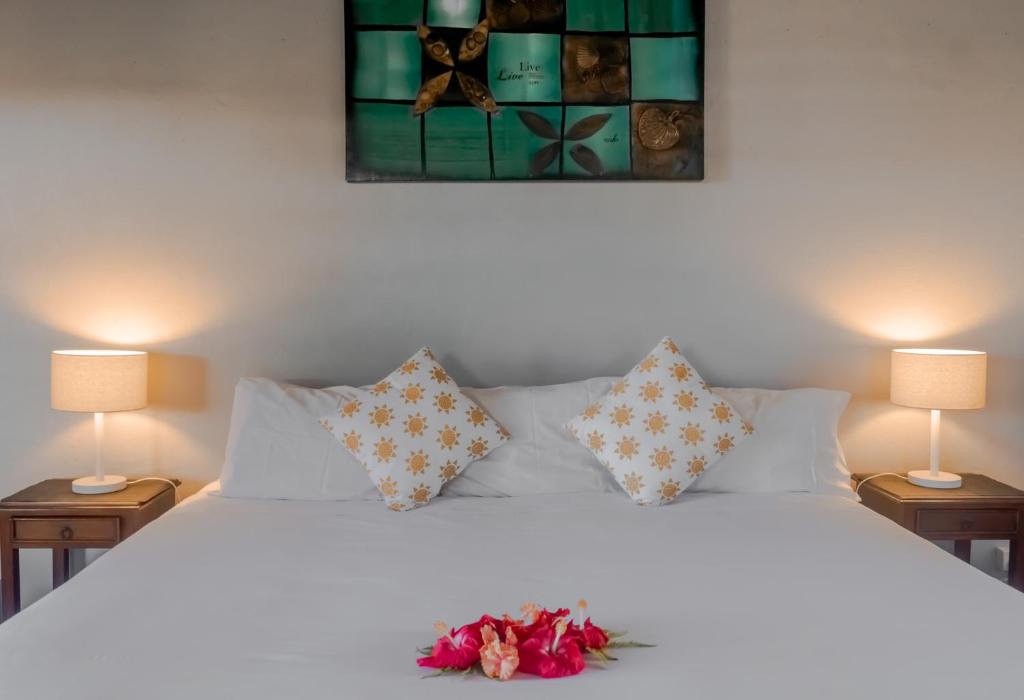 Letto o letti in una camera di Aroha Taveuni Beachfront Bures