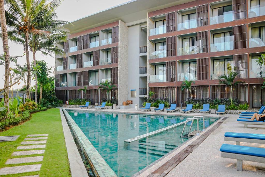 Bazén v ubytování Wyndham Tamansari Jivva Resort Bali nebo v jeho okolí
