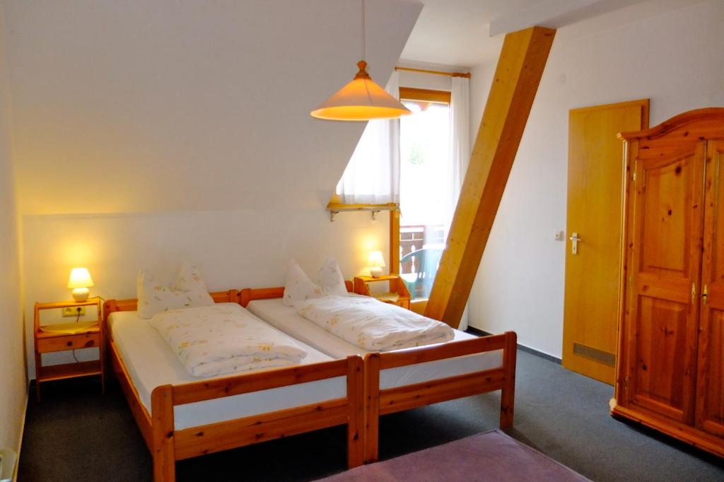 Postel nebo postele na pokoji v ubytování Hotel Löwen