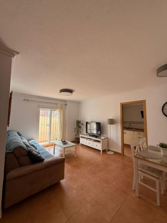 Televízia a/alebo spoločenská miestnosť v ubytovaní Encanto de Tarifa