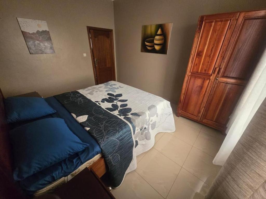 Ένα ή περισσότερα κρεβάτια σε δωμάτιο στο Home's Peace