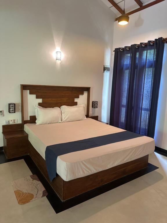 Postel nebo postele na pokoji v ubytování Honeyland hotel