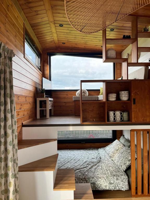 Posezení v ubytování Au sentier de Verlaine - Tiny House à Paliseul