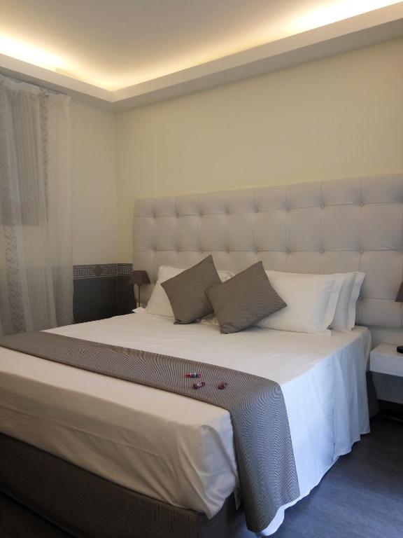 Postel nebo postele na pokoji v ubytování Mina Accomodation