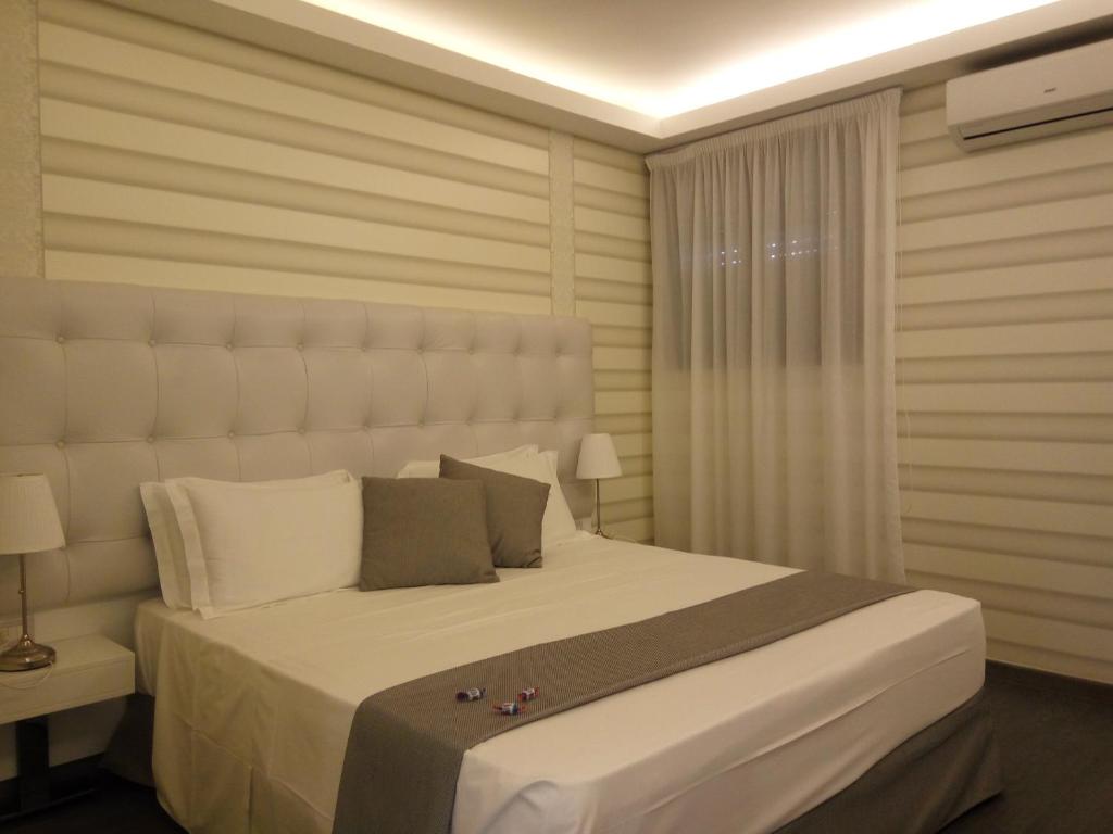 Postel nebo postele na pokoji v ubytování Mina Accomodation
