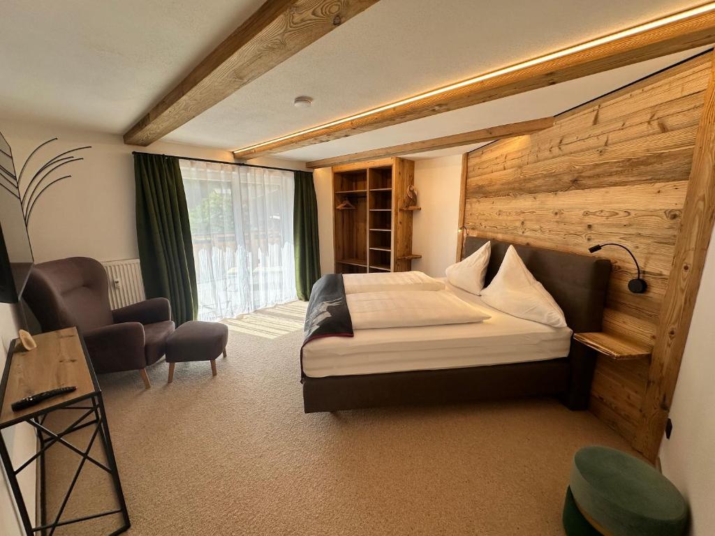 Postel nebo postele na pokoji v ubytování Klamm Lodge