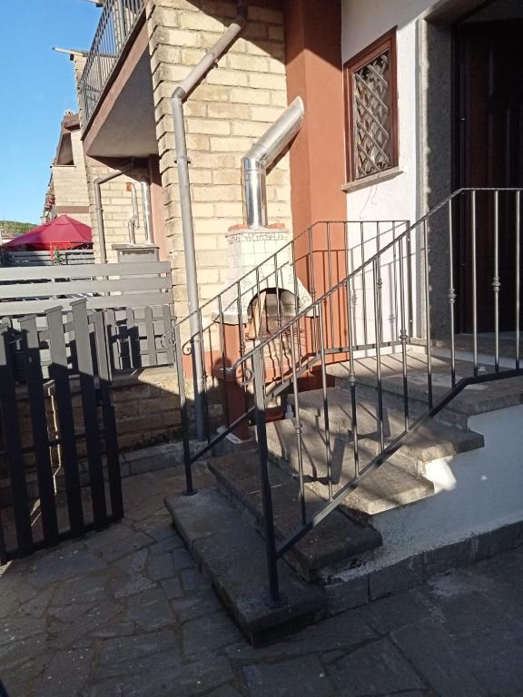 a set of stairs in front of a building at Alloggio turistico IL SOLE in Sutri