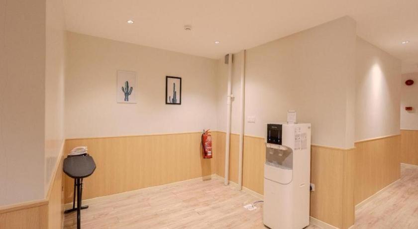 Innspire by Suntai (Previously known as WG Hotel)にあるテレビまたはエンターテインメントセンター