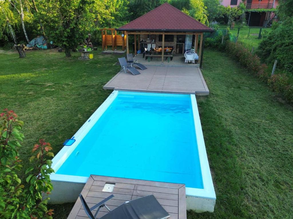 an overhead view of a swimming pool in a yard at HOOPOVO HOUSE Fruška gora in Irig