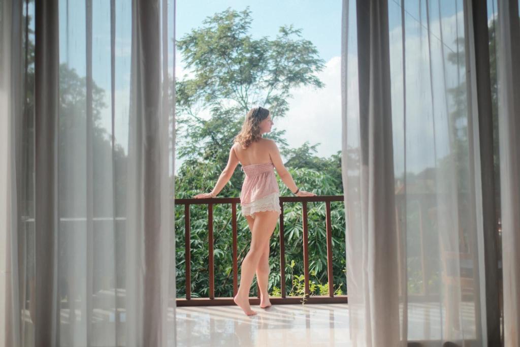 Balkón nebo terasa v ubytování Adipana Bungalow-Balinese Room
