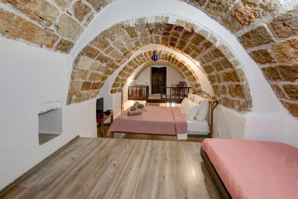 Postel nebo postele na pokoji v ubytování Pablito House-Seaview Monemvasia Nests
