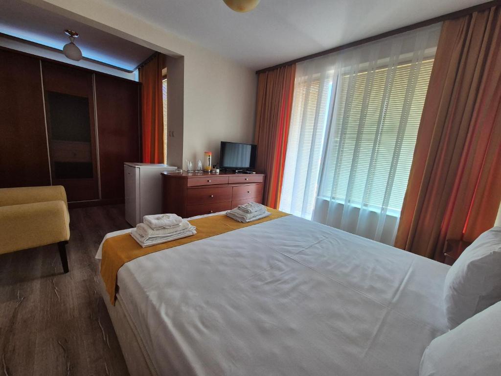 Postel nebo postele na pokoji v ubytování Dani beach Sozopol
