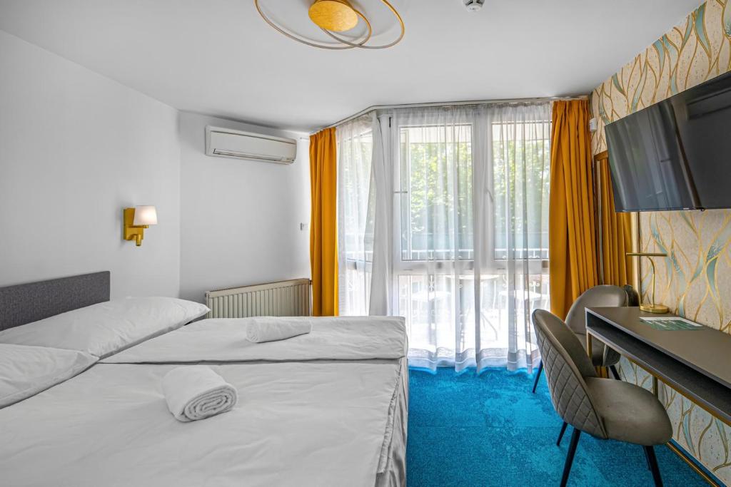 Posteľ alebo postele v izbe v ubytovaní Villa My Lake
