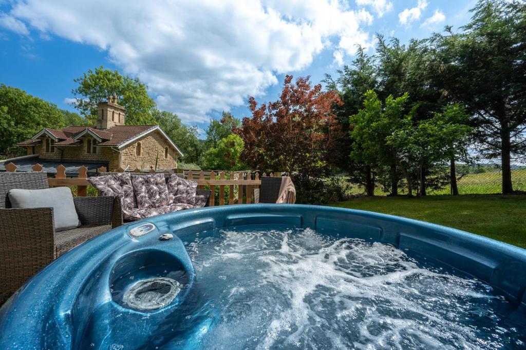 a plunge pool with water in a backyard at Lavender Lodge in Bath