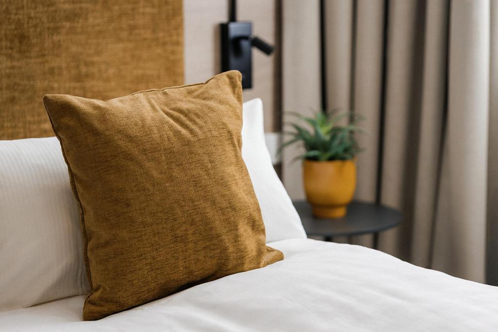 Ein Bett oder Betten in einem Zimmer der Unterkunft Hotel Schloss Montabaur