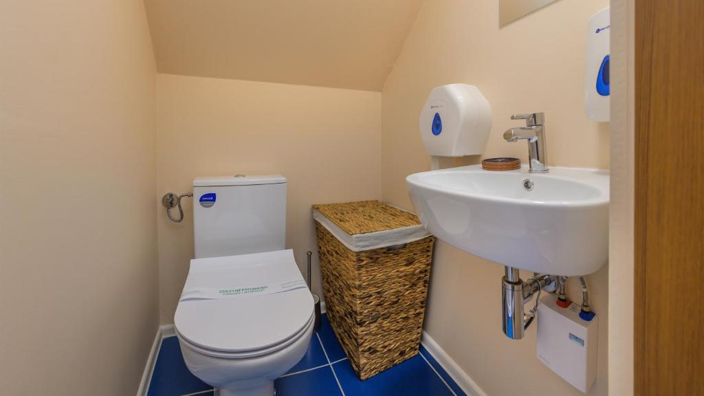 Kúpeľňa v ubytovaní Apartamenty Sun & Snow Rumiankowa