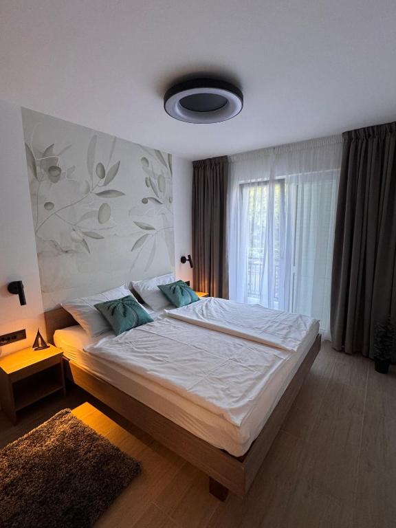 Posteľ alebo postele v izbe v ubytovaní Apartments Jakobi by El-Pi Tours