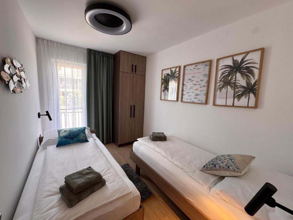 Posteľ alebo postele v izbe v ubytovaní Apartments Jakobi by El-Pi Tours