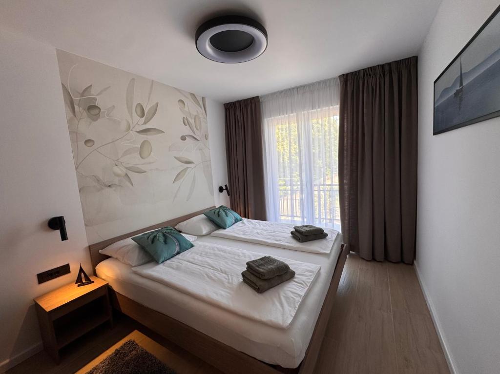 Posteľ alebo postele v izbe v ubytovaní Apartments Jakobi by El-Pi Tours