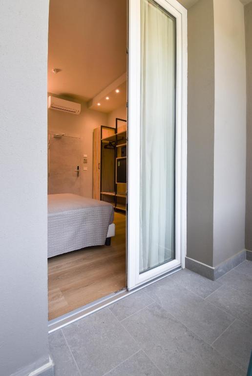 Posteľ alebo postele v izbe v ubytovaní Hotel Columbia