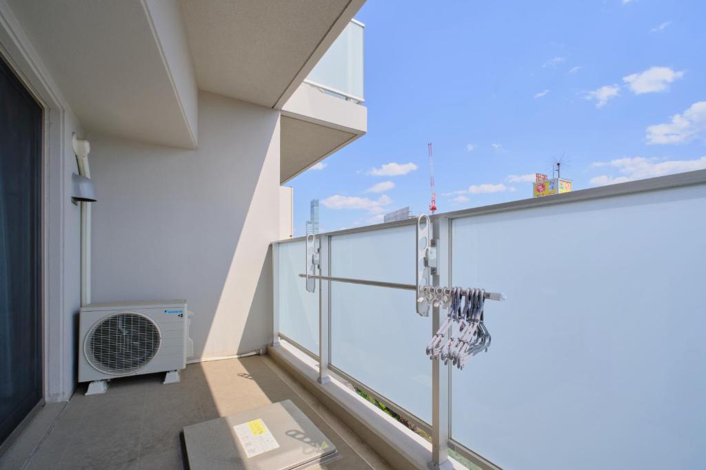 Balkón nebo terasa v ubytování Junction Namba South Hotel Apartment ジャンクション難波南ホテルアパートメント