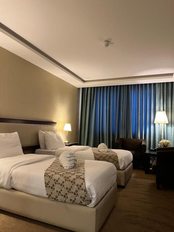 Postel nebo postele na pokoji v ubytování Strand Hotel Jordan