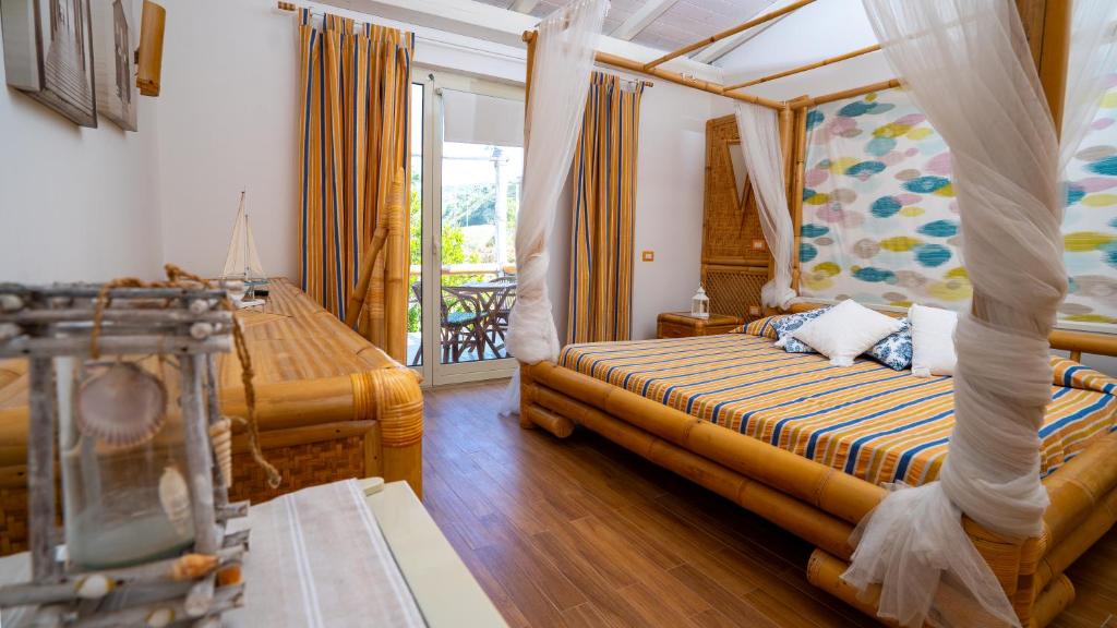 Postel nebo postele na pokoji v ubytování Locanda del Gabbiano - Acquappesa