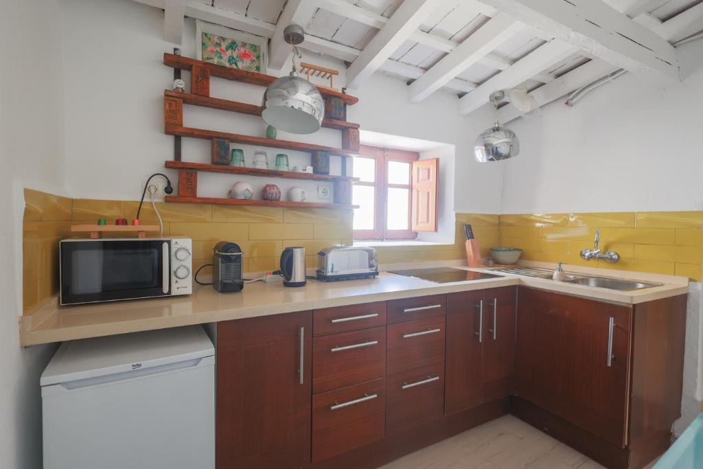 A kitchen or kitchenette at Koala Tarifa