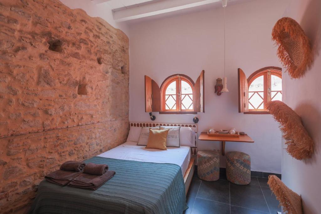 A bed or beds in a room at Koala Tarifa