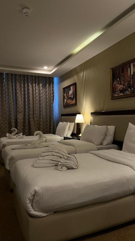 Postel nebo postele na pokoji v ubytování Strand Hotel Jordan
