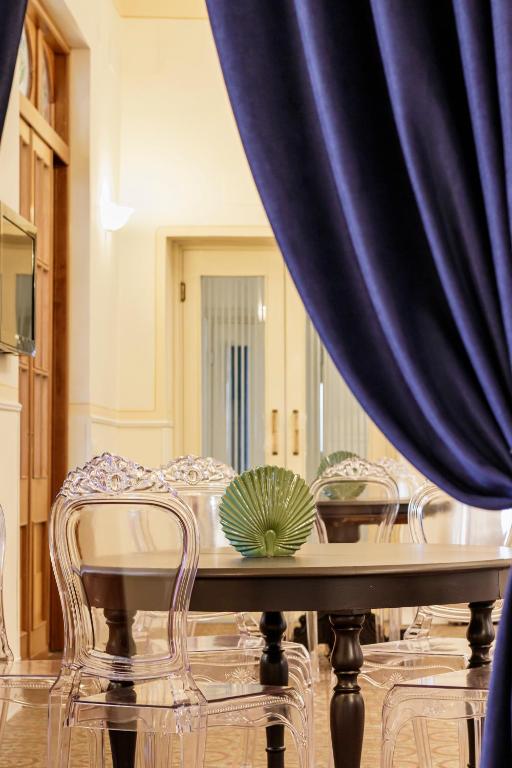 TV a/nebo společenská místnost v ubytování Boutique Hotel Heritage