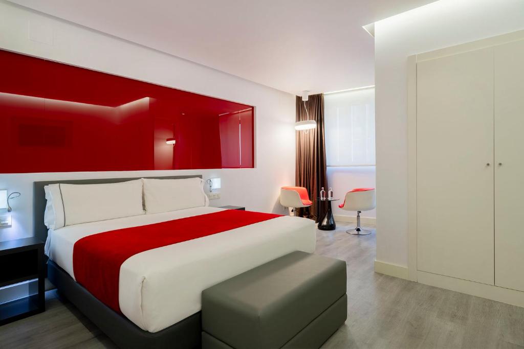 Postel nebo postele na pokoji v ubytování Eurostars Central