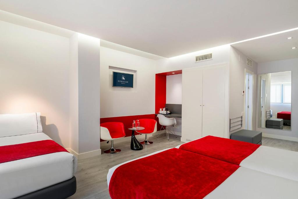 Postel nebo postele na pokoji v ubytování Eurostars Central