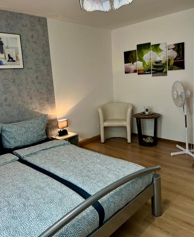 Postel nebo postele na pokoji v ubytování Handwerkswohnung Nova