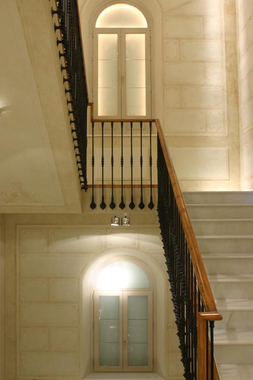 a staircase in a building with a door at Villa Oniria in Granada