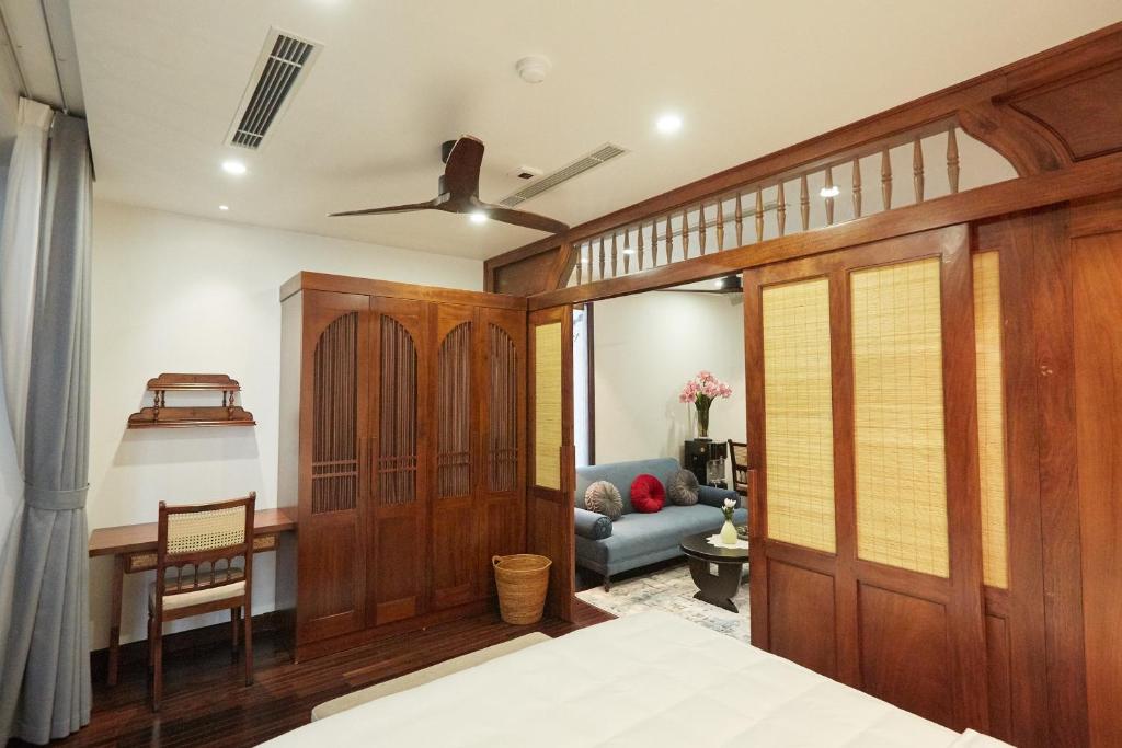 Postel nebo postele na pokoji v ubytování Camellia Residence Hanoi