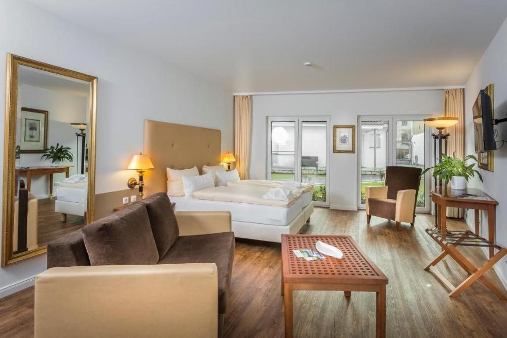 Posezení v ubytování Business-Apartment 1 mit Küche & kostenfreiem Parkplatz