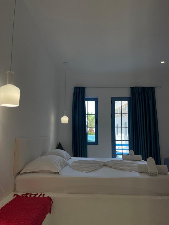 Postel nebo postele na pokoji v ubytování Cava Boutique Hotel