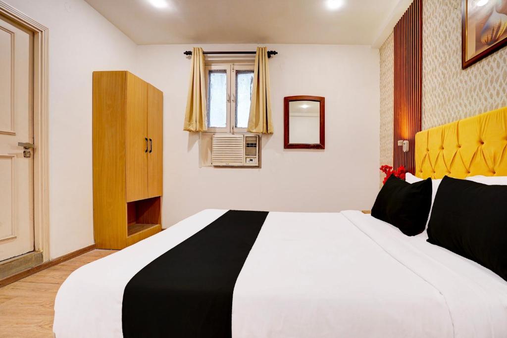 Postel nebo postele na pokoji v ubytování Super Hotel JP Palace