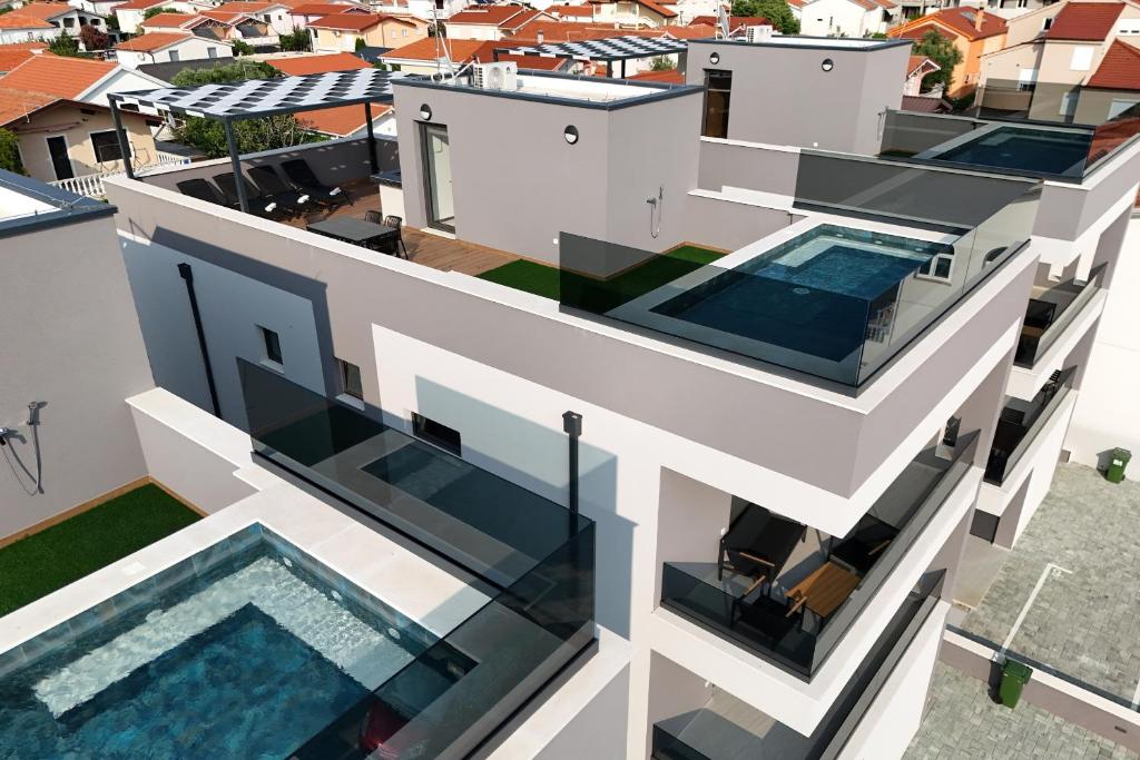 Beautiful view of Heated Pool Penthouses With Outdoor Kitchen