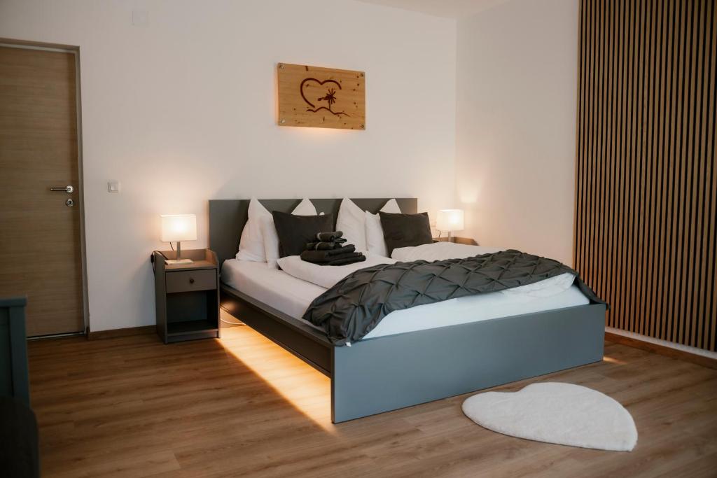 Postel nebo postele na pokoji v ubytování CLAUS RESCH APPARTEMENTS