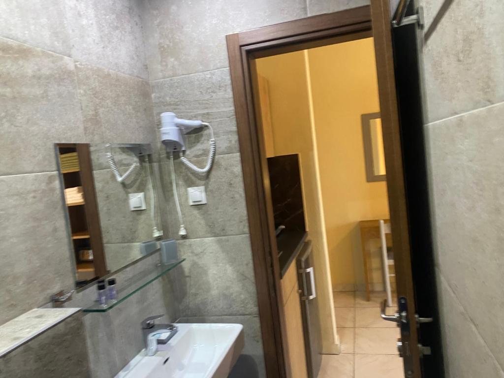 Koupelna v ubytování Oasis