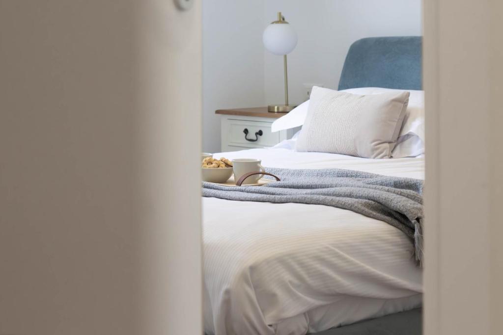 Posteľ alebo postele v izbe v ubytovaní Blue Dolphin by PortofinoHomes