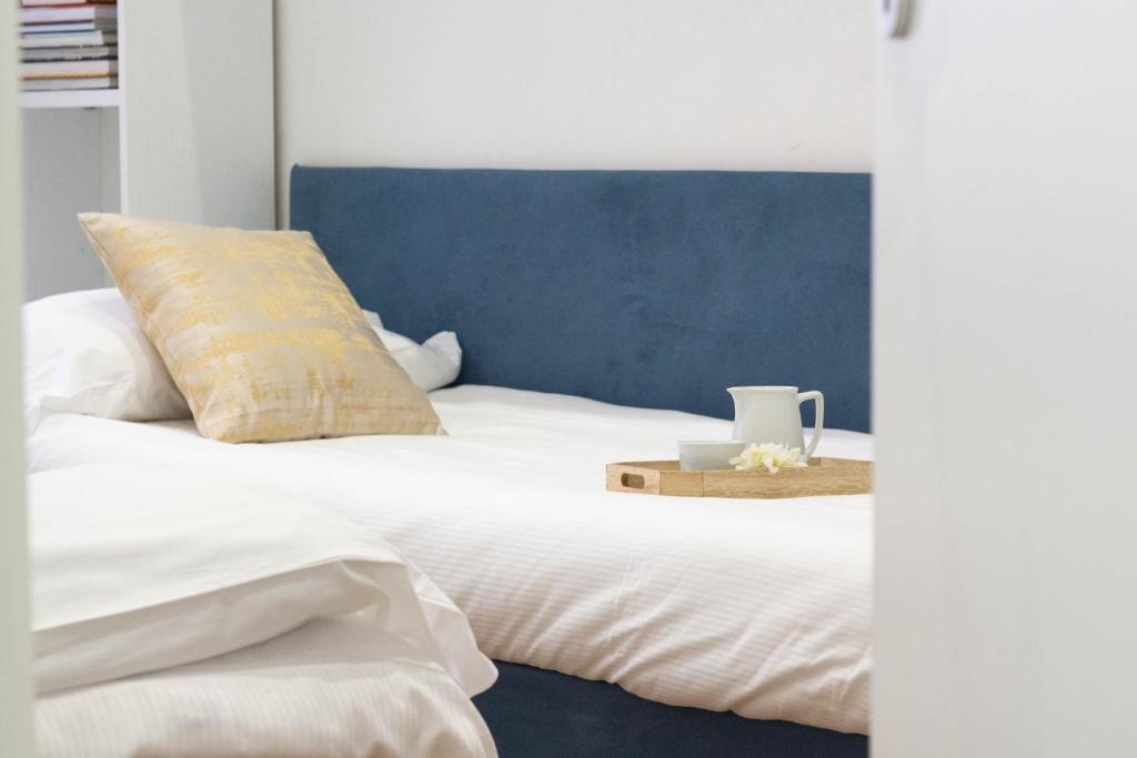 Posteľ alebo postele v izbe v ubytovaní Blue Dolphin by PortofinoHomes