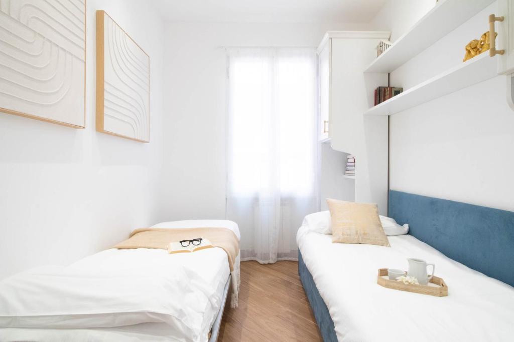 Posteľ alebo postele v izbe v ubytovaní Blue Dolphin by PortofinoHomes