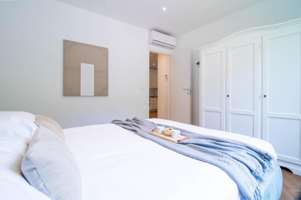 Posteľ alebo postele v izbe v ubytovaní Blue Dolphin by PortofinoHomes