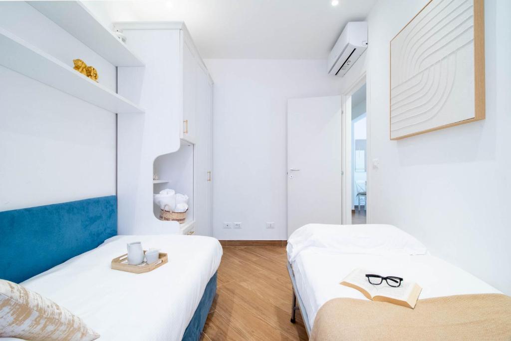 Posteľ alebo postele v izbe v ubytovaní Blue Dolphin by PortofinoHomes