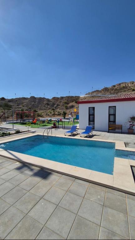 Bazén v ubytování Duplex villa in a mountain farm with a swimming pools & garden,including breakfast فيلا دوبليكس غرفتين و صالة في مزرعة جبلية مع مسابح وحديقة مع إفطار nebo v jeho okolí