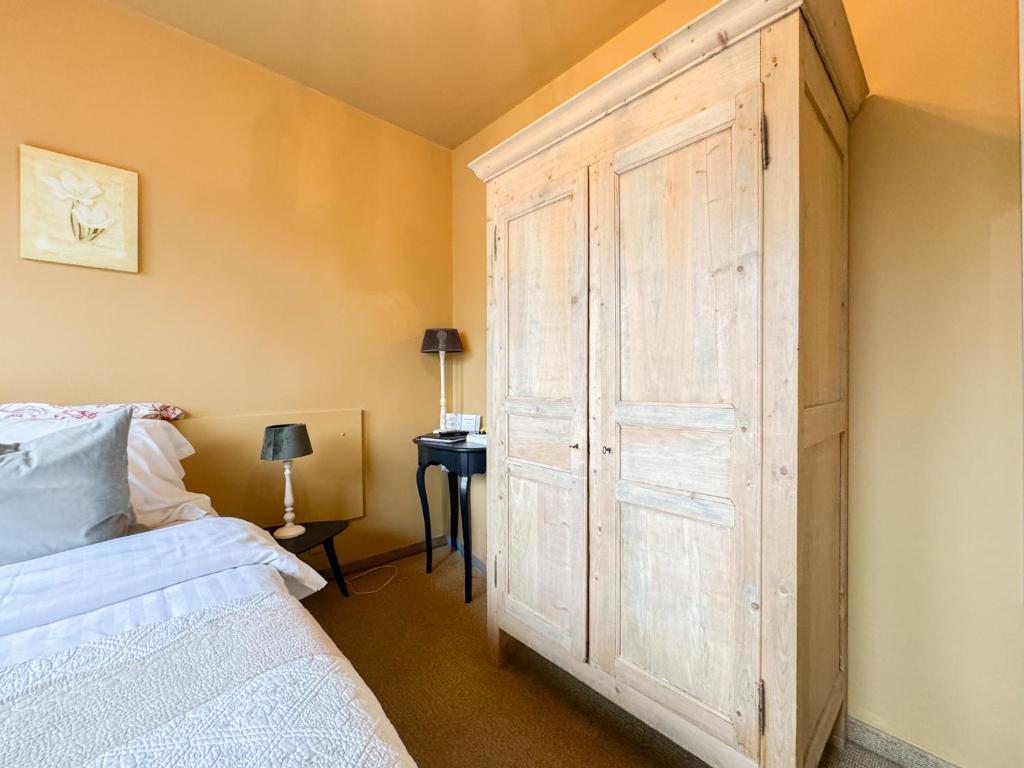 Postel nebo postele na pokoji v ubytování Hotel Botaniek